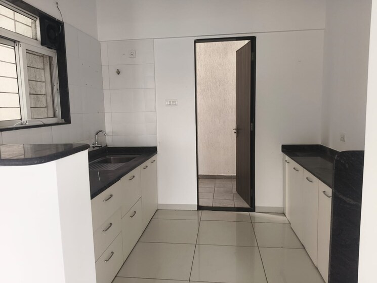 Kitchen, kolte-patil-24k-sereno 2 Bedroom 900 Sq.Ft. Apartment In Baner Pune 9425410
