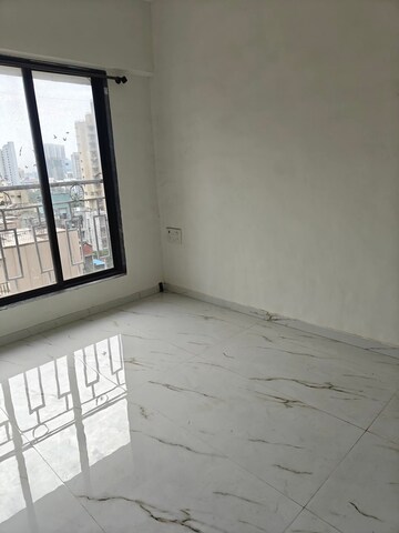 Room in 2 BHK Apartment at Malad West – for Rent