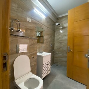 Bathroom in 3 BHK Builder Floor at Chattarpur – for Rent
