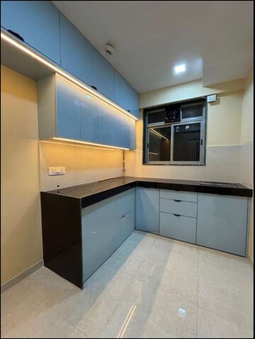 Kitchen in 1 BHK Apartment at Hiranandani Estate Villa Carino, Thane West – for Rent
