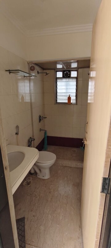 Bathroom in 3 BHK Apartment at Rizvi Victory House, Mahim West – for Sale