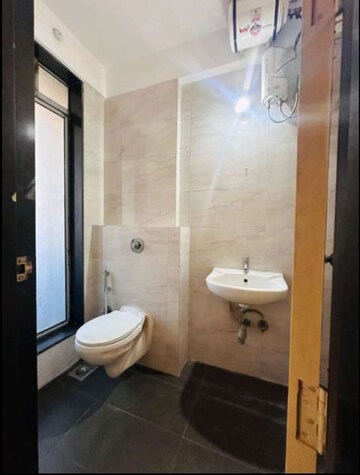 Bathroom in 3 BHK Apartment at Sheth Vasant Athena, Laxmi Nagar – for Rent