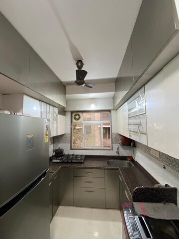 Kitchen in 3 BHK Apartment at Devidayal Apartments, Mulund West – for Rent