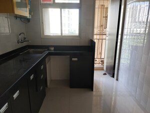 Kitchen in 2 BHK Apartment at Rosa Oasis, Thane West – for Rent