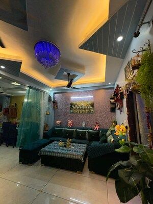 Living Room in 2 BHK Apartment at Capital Royal Casa, Gms Road – for Sale