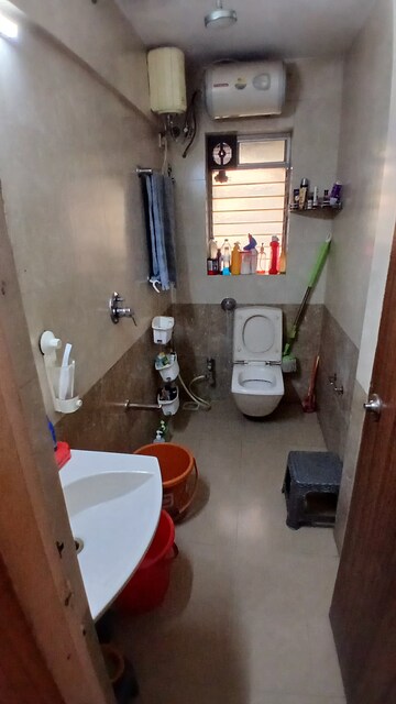 Bathroom in 2 BHK Apartment at Lokhandwala Whispering Palms, Kandivali East – for Sale