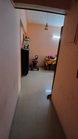 Room in 2 BHK Apartment at Lokhandwala Whispering Palms, Kandivali East – for Sale