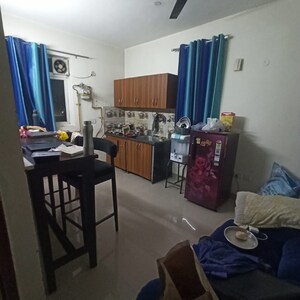 Living Room in 1 BHK Apartment at Urbtech Xaviers, Sector 168 – for Rent