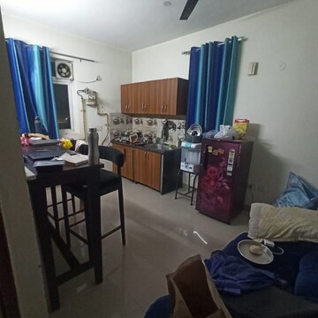 Living Room in 1 BHK Apartment at Urbtech Xaviers, Sector 168 – for Rent