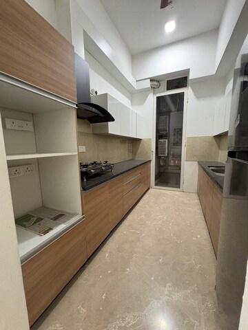 Kitchen in 4 BHK Apartment at Omkar Alta Monte, Malad East – for Rent