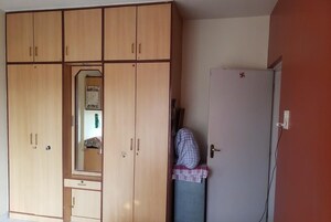 Bedroom in 2 BHK Apartment at Sudhir Krishnakala CHS, Dahanukar Colony – for Sale