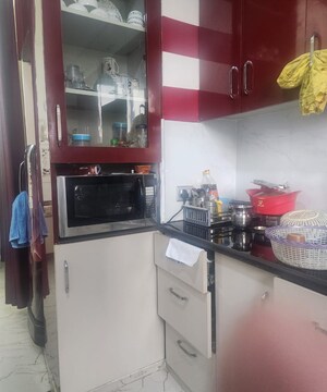 Kitchen in 2 BHK Apartment at Express Garden, Vaibhav Khand – for Sale