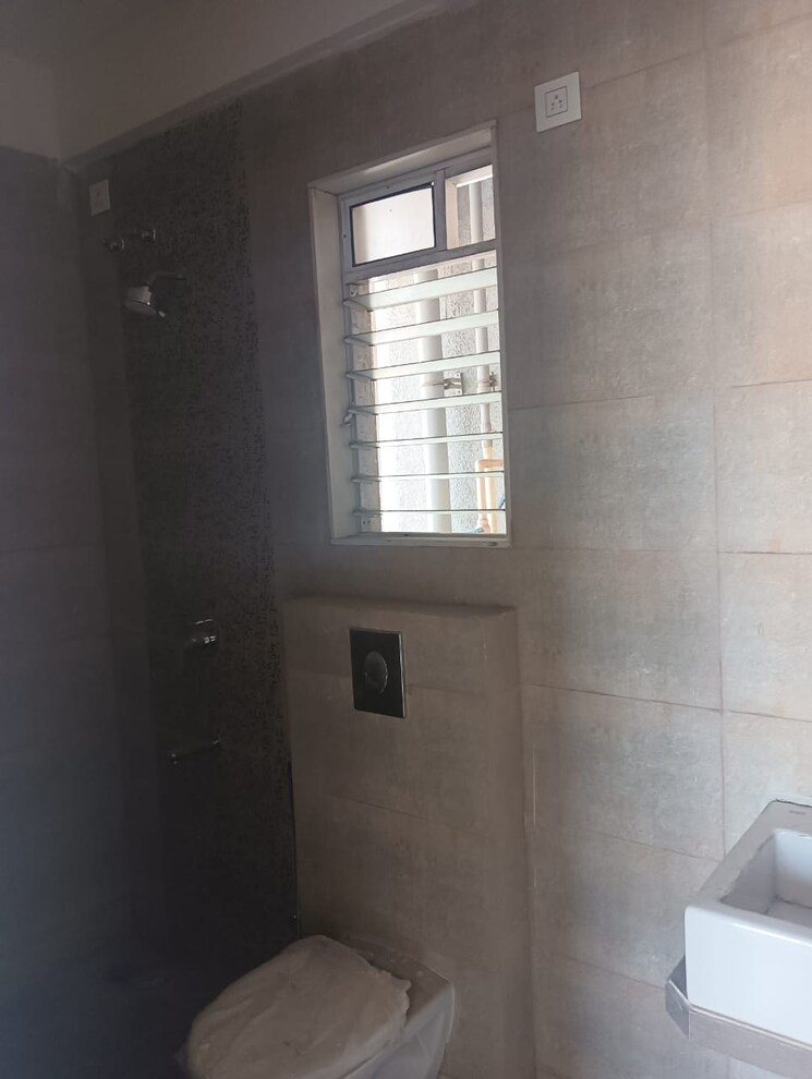 Bathroom, rosa-manhattan 2 Bedroom 754 Sq.Ft. Apartment In Ghodbunder Road Thane 9426202