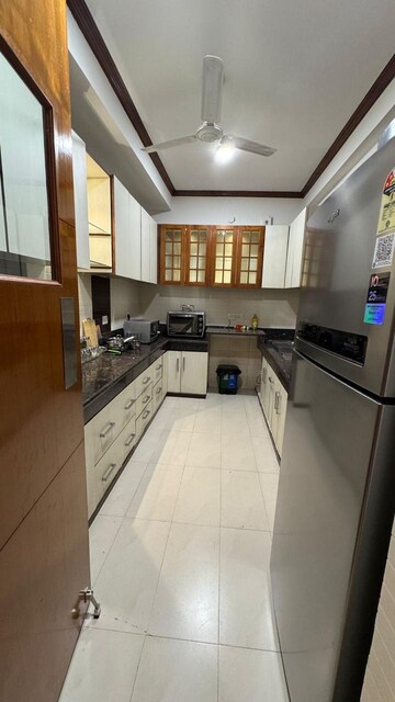 Kitchen in 3 BHK Apartment at Malcha Marg – for Rent