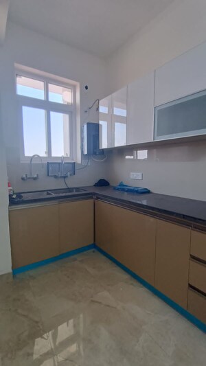 Kitchen in 2 BHK Apartment at Artique Uptown Skylla, International Airport Road – for Rent