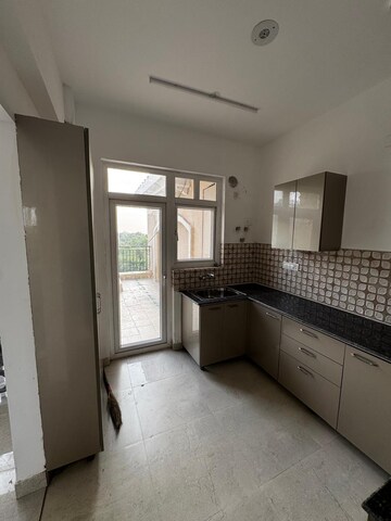 Kitchen in 3 BHK Apartment at Urbtech Xaviers, Sector 168 – for Rent