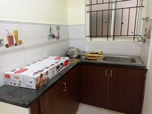Kitchen in 2 BHK Builder Floor at Rajpur Khurd Extension – for Sale