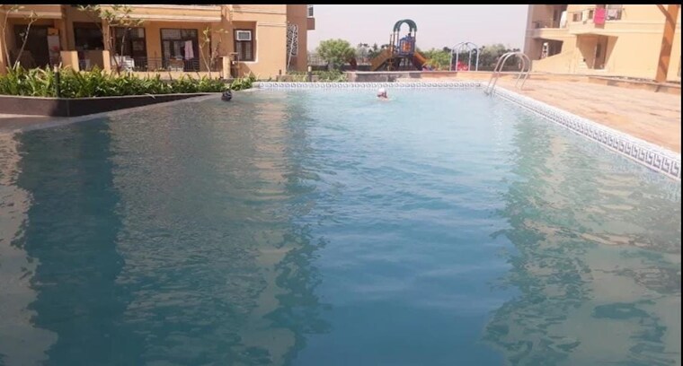 Swimming Pool, migsun-green-mansion 2 Bedroom 1050 Sq.Ft. Apartment In Zeta I Greater Noida Greater Noida 9426547