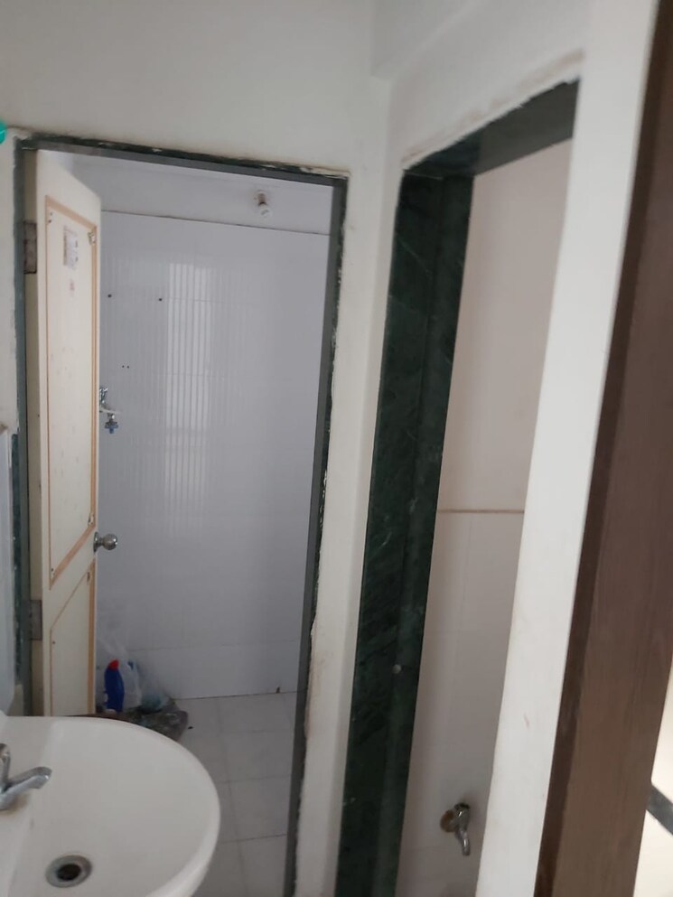 Bathroom, popular-colony-apartment 1 Bedroom 650 Sq.Ft. Apartment In Warje Pune 9426568
