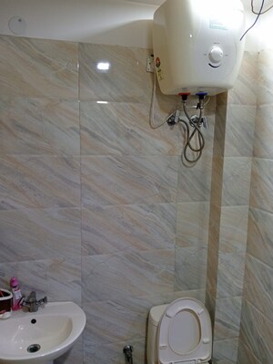 Bathroom in 3 BHK Builder Floor at Sai Sthal Apartment, Niti Khand – for Rent