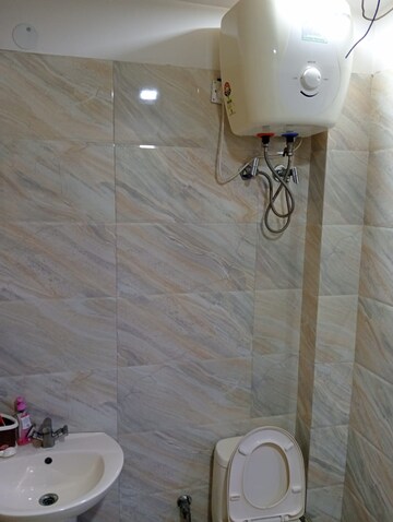 Bathroom in 3 BHK Builder Floor at Sai Sthal Apartment, Niti Khand – for Rent