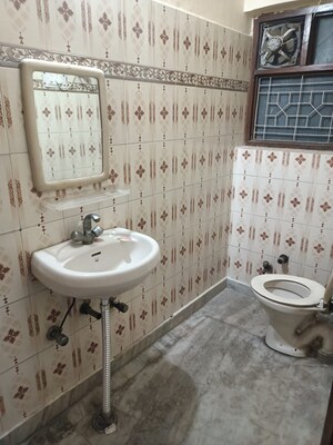 Bathroom in 3 BHK Builder Floor at Nirman Vihar – for Rent