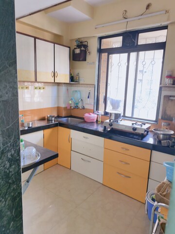 Kitchen in 1 BHK Apartment at Lodha Paradise, Majiwada – for Sale