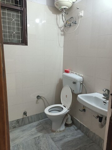 Bathroom in 2 BHK Builder Floor at Defence Colony – for Rent