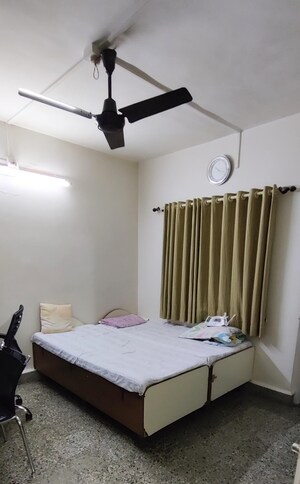 Bedroom in 2 BHK Apartment at Guru Ganesh Nagar Society, Kothrud – for Rent