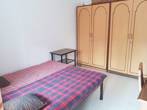 Bedroom in 3 BHK Apartment at Signet Yogeshwar CHS, Dahanukar Colony – for Rent