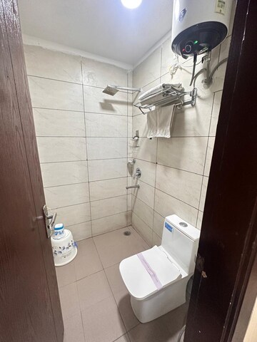 Bathroom in Studio Apartment at Motia Citi Royal Business Park, Ambala Highway – for Rent