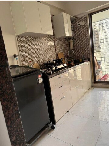 Kitchen in 3 BHK Apartment at New India Grace Luxuria, Malad West – for Rent