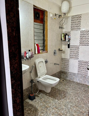 Bathroom in 2 BHK Apartment at Gabadia Heights, Kandivali West – for Rent
