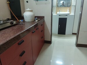 Kitchen in 2 BHK Apartment at K Raheja Palm Court, Malad West – for Rent