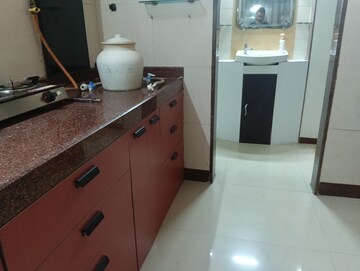 Kitchen in 2 BHK Apartment at K Raheja Palm Court, Malad West – for Rent