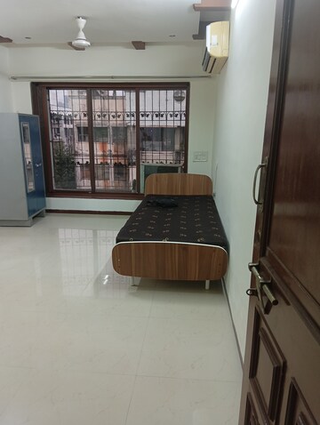 Living Room in 2 BHK Apartment at K Raheja Palm Court, Malad West – for Rent