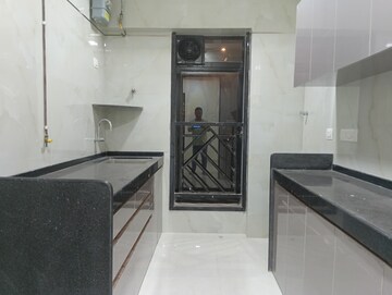 Kitchen in 2 BHK Apartment at Romell Diva, Malad West – for Rent