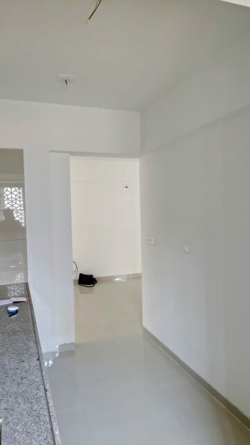 Building Lobby in 2 BHK Apartment at Shilp Ananta, Shela – for Rent