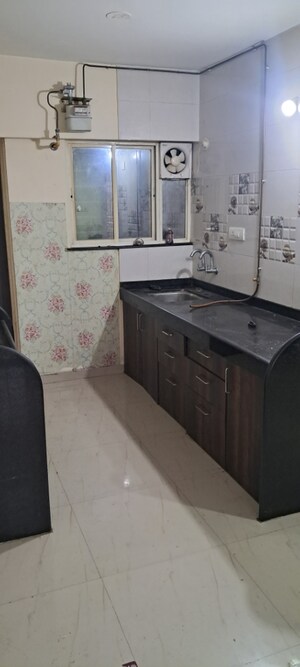 Kitchen in 2.5 BHK Apartment at Aswani Green Valley, Wakad – for Rent