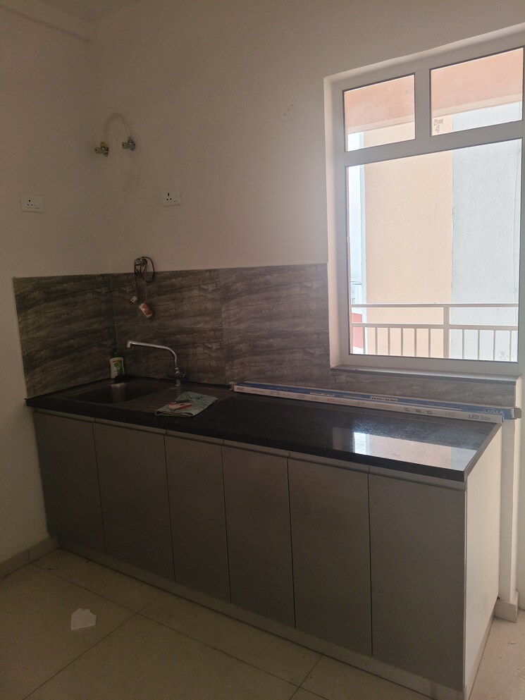 Kitchen, shapoorji-pallonji-joyville-gurgaon 3 Bedroom 1852 Sq.Ft. Apartment In Sector 102 Gurgaon 9427304
