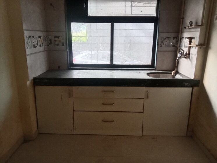 Kitchen, rna-ng-regency-phase-i 1 Bedroom 450 Sq.Ft. Apartment In Balkum Pada Thane 9427348