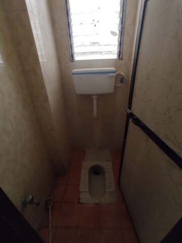 Bathroom in 1 BHK Apartment at Rutu Estate, Brahmand – for Rent
