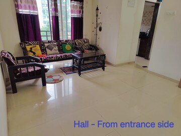 Living Room in 1 BHK Apartment at Gala Lifestyle Pride Residency, Kasarvadavali – for Rent