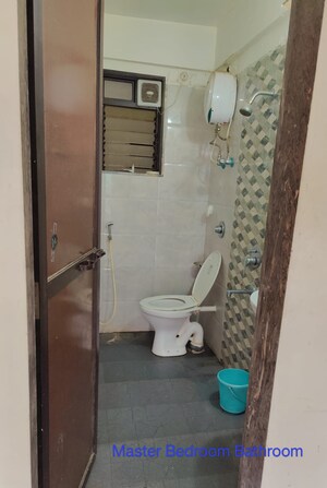 Bathroom in 1 BHK Apartment at Gala Lifestyle Pride Residency, Kasarvadavali – for Rent