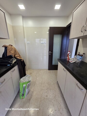 Kitchen in 3 BHK Apartment at Ekta Eminente Phase II, Khar West – for Rent