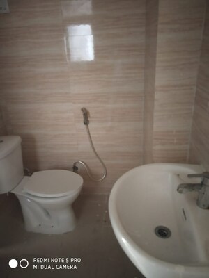 Bathroom in 3 BHK Apartment at Amrapali Zodiac, Sector 120 – for Sale