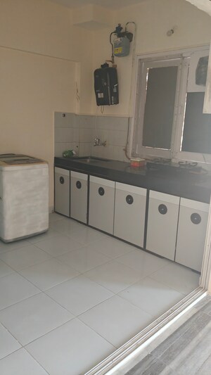 Kitchen in 1 BHK Apartment at Crystal Garden Estate CHS, Manpada – for Rent