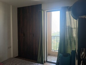 Bedroom in 2 BHK Apartment at Kiara Residency, Sushant Golf City – for Rent