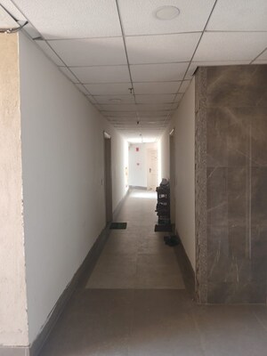 Building Lobby in 2 BHK Apartment at Kiara Residency, Sushant Golf City – for Rent