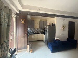 Living Room in 2 BHK Apartment at Gardenia Golf City, Sector 75 – for Rent